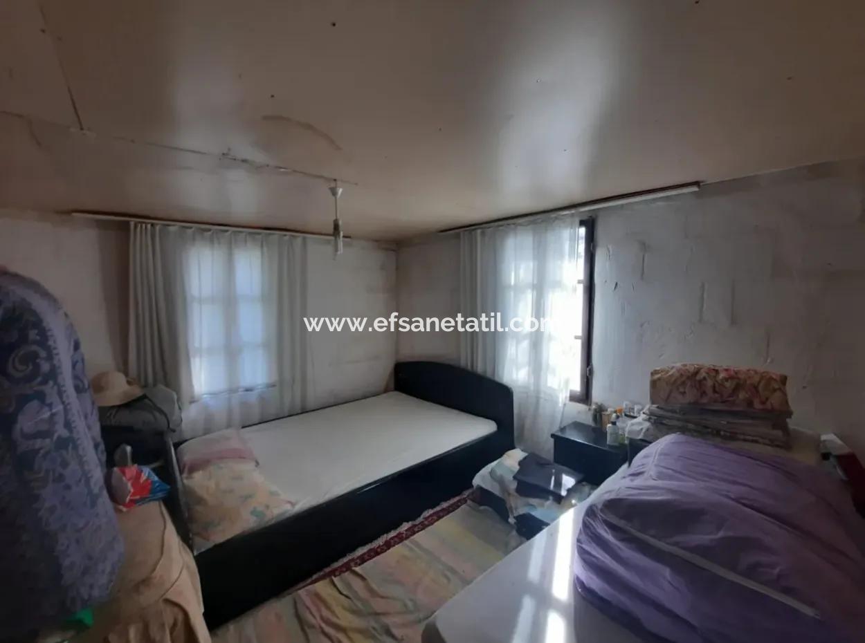 11.650M2 Freistehendes Grundstück Mit Meerblick Und 1 1 Haus Zum Verkauf In Göcek Gökçeovacik