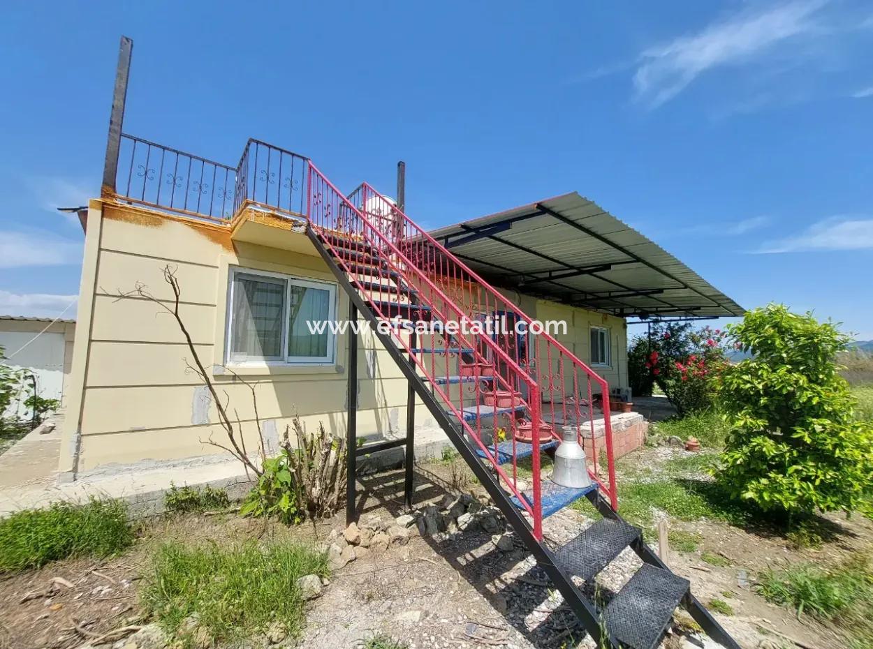 Einfamilienhaus Und Grundstück Zum Verkauf In Muğla Ortaca Tepearası