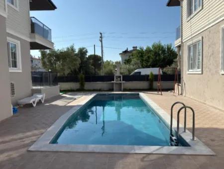 1 1 Wohnung Mit Pool Zu Verkaufen In Ortaca Cumhuriyet
