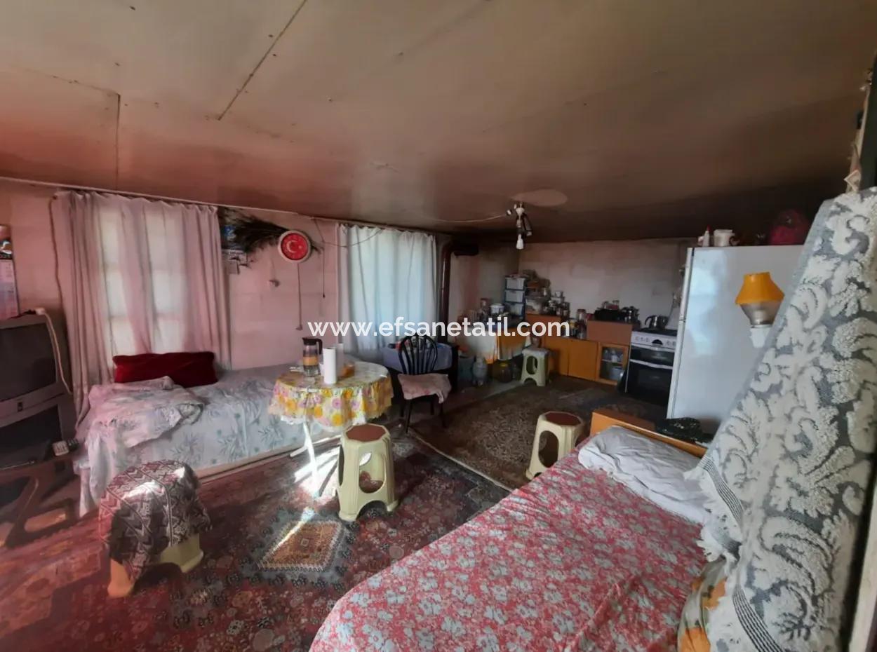 Göcek Gökçeovacıkta Deniz Manzaralı 11,650M2 Müstakil Arazi Ve 1+1 Ev Satılık