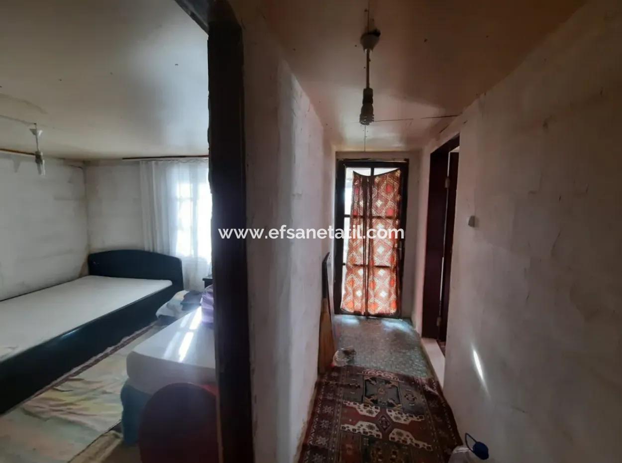 Göcek Gökçeovacıkta Deniz Manzaralı 11,650M2 Müstakil Arazi Ve 1+1 Ev Satılık