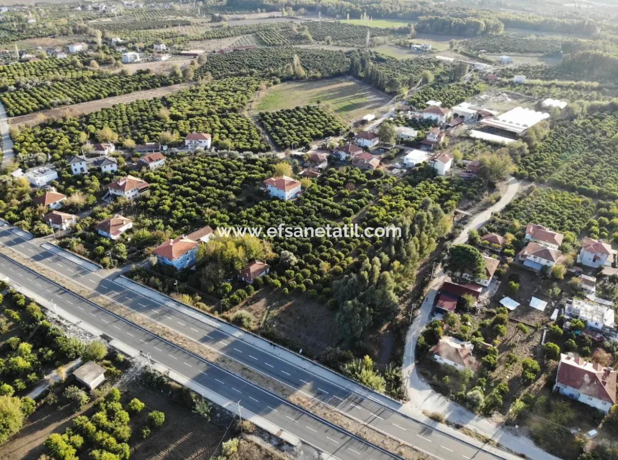 Köyceğiz Toparlar’da Ana Yola Cepheli 2.800 M² Ticari/Konut İmarlı Arsa Satılık