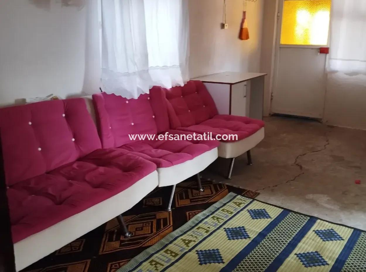 Muğla Ortaca Sarıgerme Merkezde  485 M² İmarlı Satılık Arsa – Köy Evi + Depolu