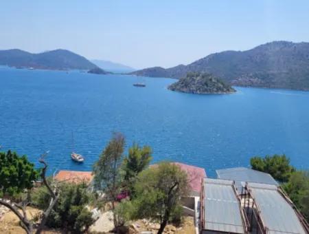 Muğla Marmaris Turunç Amos Koyunda 4 412 M2 Denize Sıfır Arazi Satılık